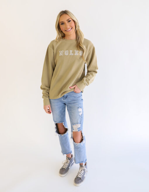 Girl wearing Barefoot Florida State FSU NOLES embroidered sweatshirt