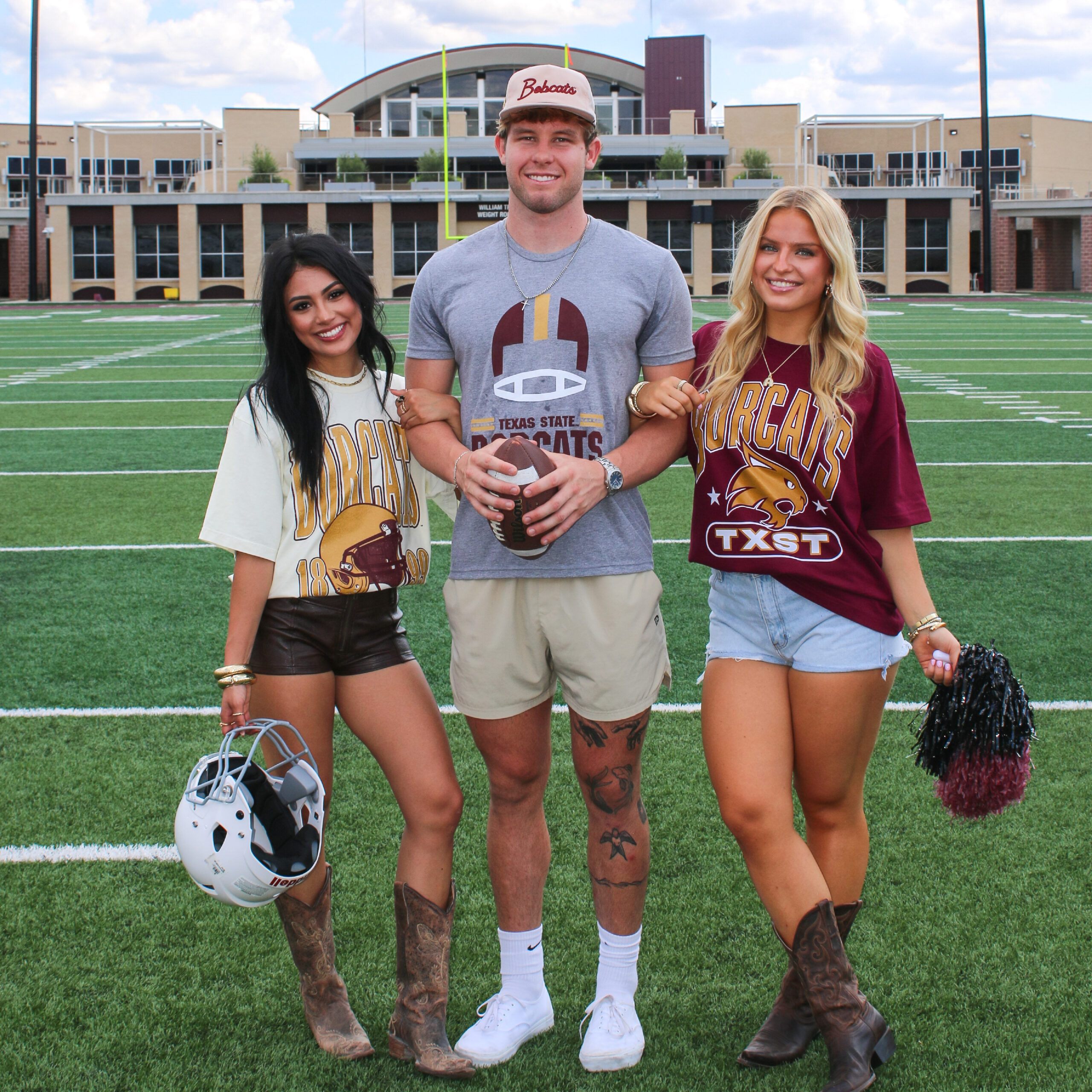 Group of three people wearing Texas State apparel