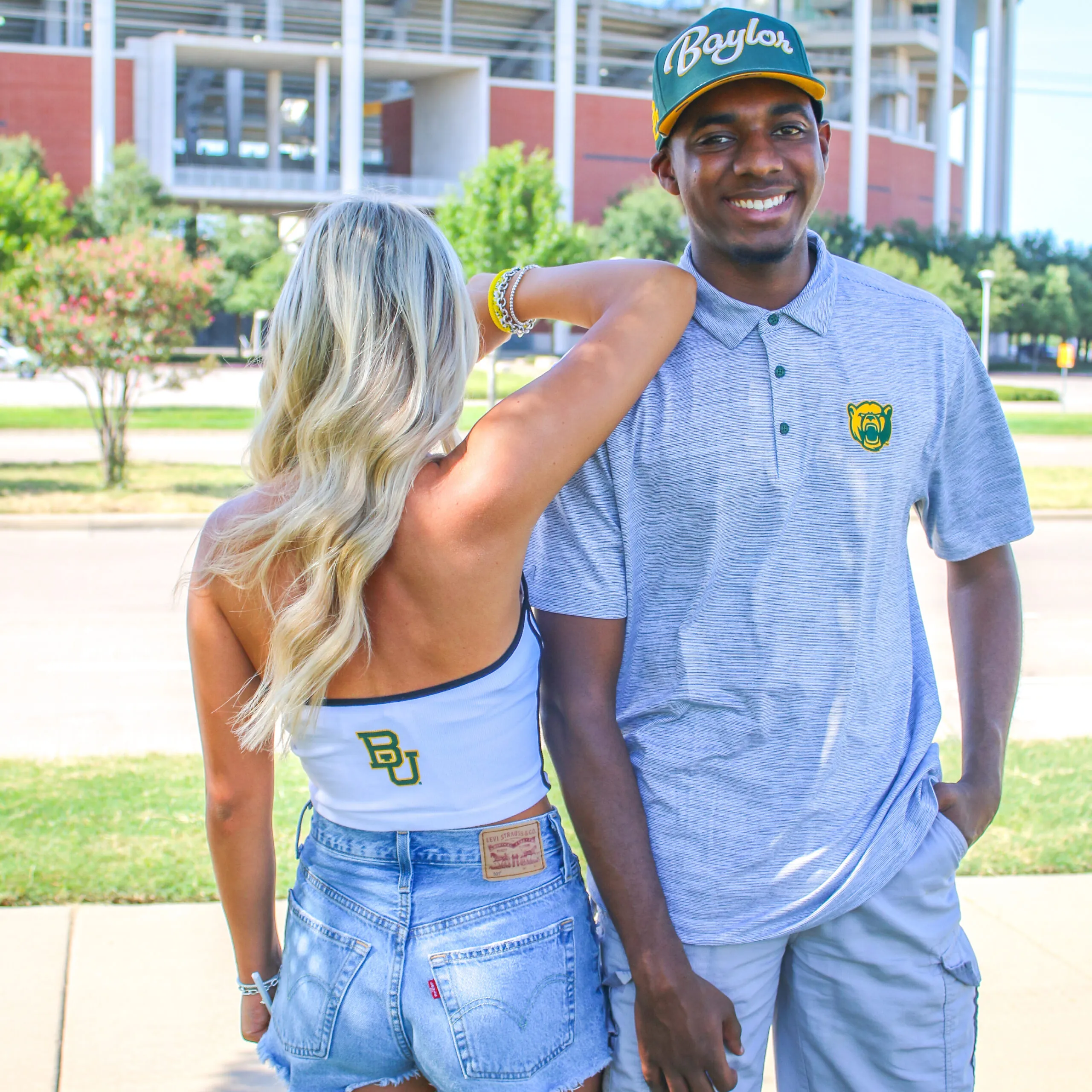 Man and Woman wearing Baylor apparel