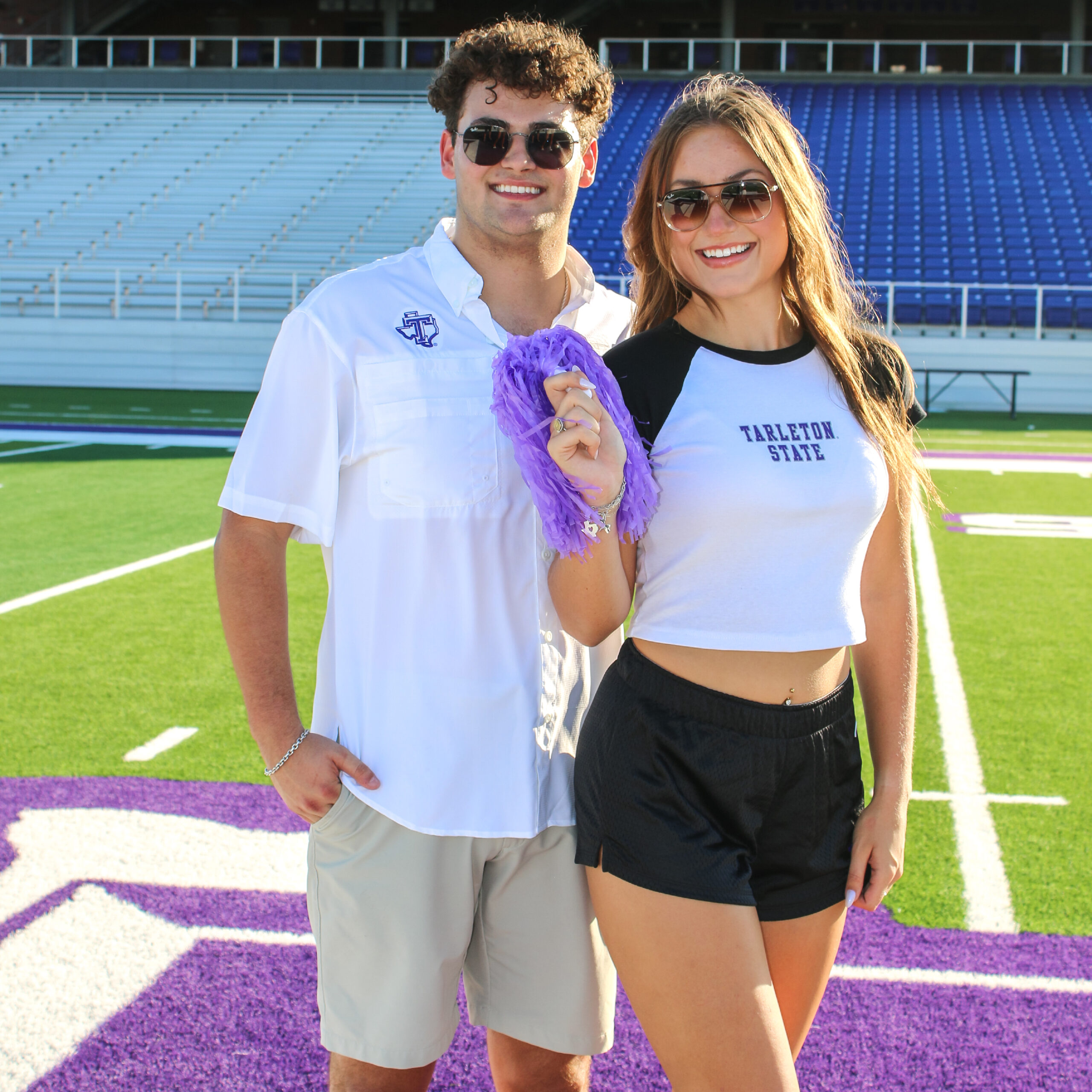 Man and woman wearing Tarleton State apparel