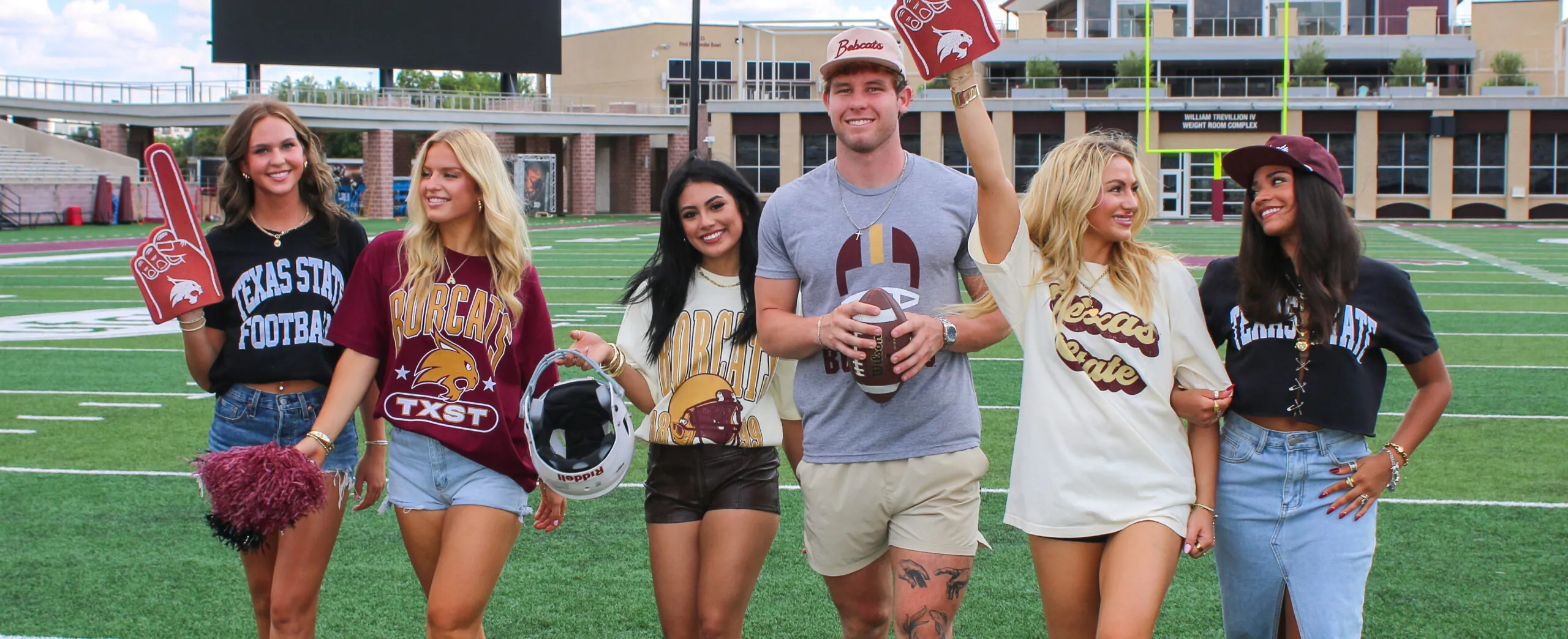 Group of people wearing Texas State Apparel